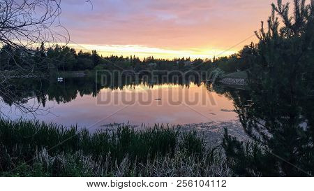 Beautiful Sundown Around Beaumaris Lake, Edmonton's Largest Stormwater Pond, In Alberta, Canada