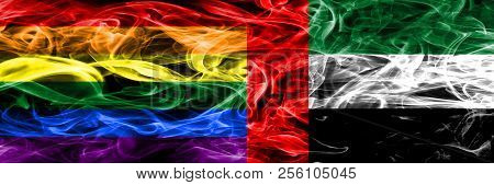 Gay Vs United Arab Emirates Smoke Flags Placed Side By Side. Thick Colored Silky Smoke Flags Of Gay 