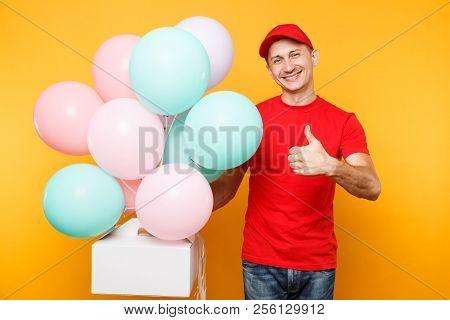 Man Giving Food Order Cake Box Isolated On Yellow Background. Male Employee Courier In Red Cap T-shi