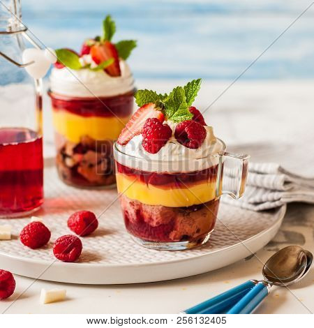 Fruit Cake, Jelly, Custard, Berry And White Cocolate Whipped Cream Individual Trifles, Square