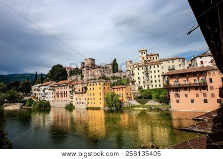 Bassano Del Grappa Town And The River Brenta Seen From The Famous Ponte Degli Alpini Or Ponte Vecchi