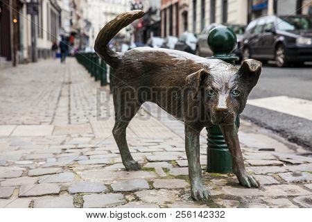 Brussels, Belgium - March, 2018: Dog Peeing Statue Called Zinneke Pis