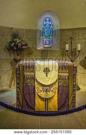Edinburgh, Scotland, Uk - June 14, 2012: Draped Altar And Stained Glass Window Of St Andrew Behind A