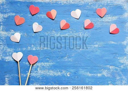 Red Hearts On A Blue Wooden Table. Valentines Day Background.