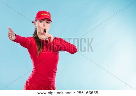 Lifeguard Woman Girl In Red Cap On Duty Supervising Swimming Pool Water Blowing Whistle On Blue. Acc