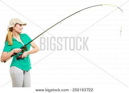 Fishery, Spinning Equipment, Angling Sport And Activity Concept. Happy Smiling Woman With Fishing Ro