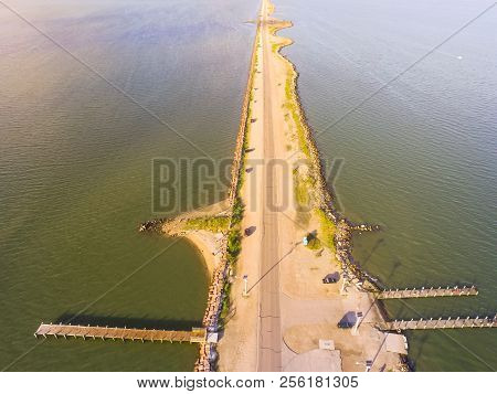 Aerial view banks of famous Texas City Dike, a levee that projects nearly 5miles south-east into mou