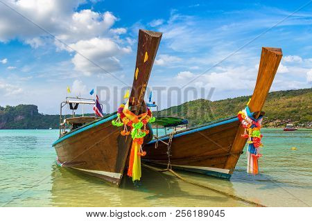 Traditional Thai Longtail Boat At Log Dalum Beach On Phi Phi Don Island, Thailand In A Summer Day