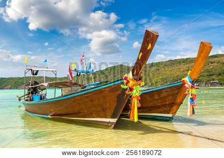 Traditional Thai Longtail Boat At Log Dalum Beach On Phi Phi Don Island, Thailand In A Summer Day
