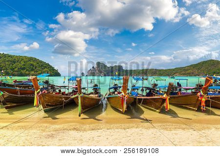Traditional Thai Longtail Boat At Log Dalum Beach On Phi Phi Don Island, Thailand In A Summer Day