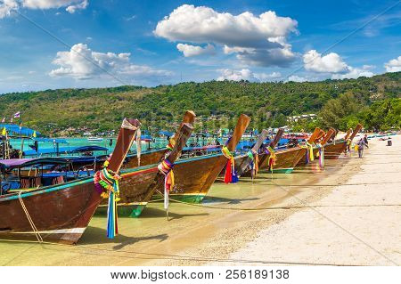 Traditional Thai Longtail Boat At Log Dalum Beach On Phi Phi Don Island, Thailand In A Summer Day