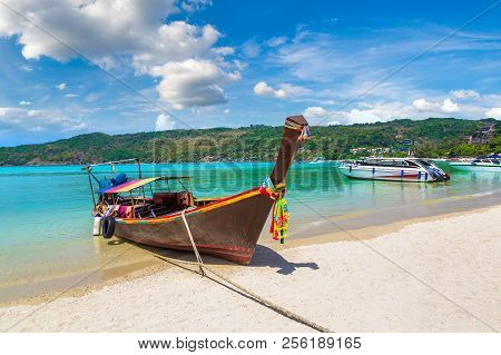 Traditional Thai Longtail Boat At Log Dalum Beach On Phi Phi Don Island, Thailand In A Summer Day