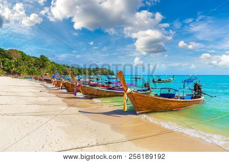 Traditional Thai Longtail Boat At Log Dalum Beach On Phi Phi Don Island, Thailand In A Summer Day