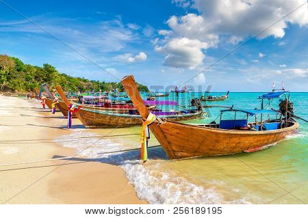 Traditional Thai Longtail Boat At Log Dalum Beach On Phi Phi Don Island, Thailand In A Summer Day