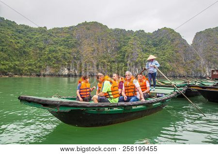 Halong, Vietnam - June 17, 2018: Tourists In Boats In Halong Bay, Vietnam In A Summer Day