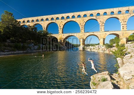 Remoulins,france-august 12, 2016::the Famous Pont Du Gard Roman Aqueduct During A Sunny Day