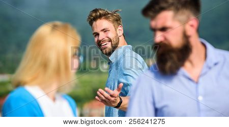 Man With Beard Jealous Aggressive Because Girlfriend Interested In Handsome Passerby. Husband Strict