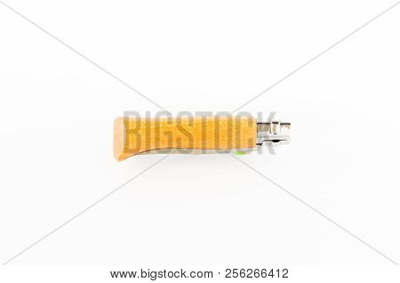 Folding Knife. The Knife Is Folded. Wooden Handle. Knife On White.