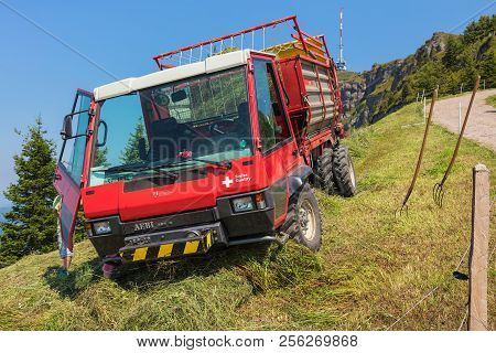 Mt. Rigi, Switzerland - July 19, 2018: An Aebi Multipurpose Transporter On The Slope Of Mt. Rigi. Ae