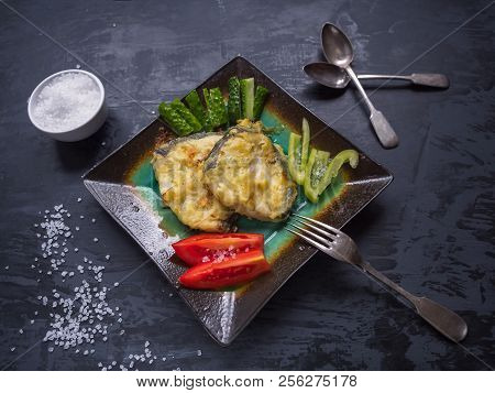 A Useful Breakfast Of Fried Cod And Fresh Vegetables