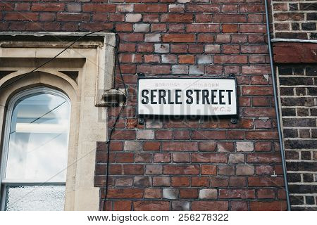 London, Uk - July 24, 2018: Street Name Sign On A Side Of A Building On Serle Street Near Lincolns I