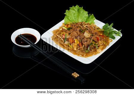 Vietnamese Dish Mien Xao Bo Is A Stir-fried Glass Noodles With Beef And Vegetables