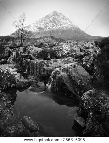Pools And Majestatic Waterfalls Belllow Snowy Mountains. Blue Water Mirrorong Blue Cloudy Sky