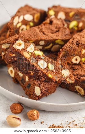 Italian Dessert Panforte With Nuts, Chocolate And Candied Fruits. White Background, Italian Dessert 