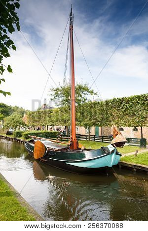 Enkhuizen, Netherlands - August 19, 2015 - The Boat At The Canal In The Traditional Old Fisherman Vi