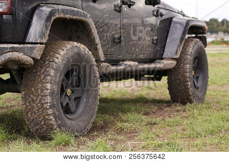 Copenhagen, Denmark - September 1, 2018: Close Up Of Dirty Jeep Wrangler After Driving Heavy Off-roa