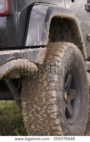 Copenhagen, Denmark - September 1, 2018: Close Up Of Dirty Suv After Driving Heavy Off-road In Wet T