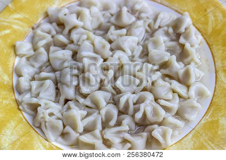 Close-up Shoot For Traditional Taste Turkish Ravioli With Yellow Banded Plate