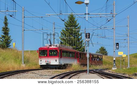 Mt. Rigi, Switzerland - July 19, 2018: A Passenger Train Approaching The Rigi-staffel Station. Mt. R