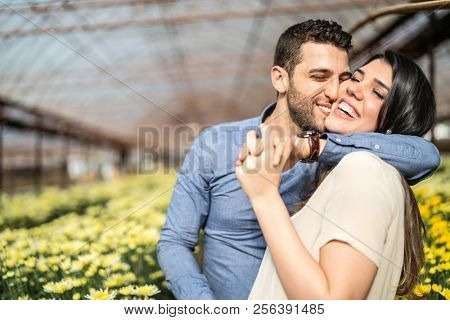 Romantic Couple on a Love Moment at Greenhouse in Holambra, Sao Paulo, Brazil