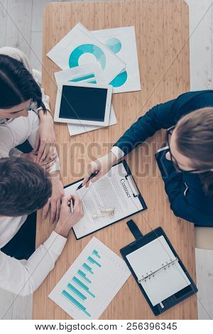 Contract Sign, Purchase, New House Owners. Top Above High Angle View Of Elegant Businesspeople Signi