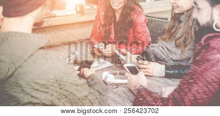 Happy Millennials Friends Using Smartphones Inside Bar - Young Trendy People Having Fun With Mobile 