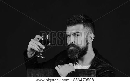 Winetasting And Degustation Concept. Degustator With Serious Face