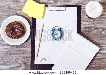 Good Morning! Time For Work! Closeup Of Alarm Clock, Office Accessories On Wooden Background