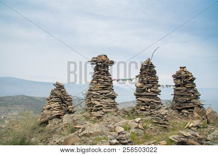 Rock Pillars On Top Of The Hillock Dedicated To A Local Tutelary Deity