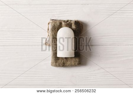 Eco Natural Crystal Alunite Deodorant Flat Lay On Rustic Background. Sustainable Lifestyle Concept. 