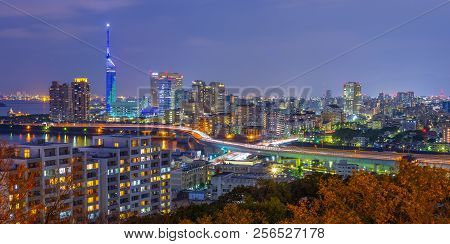 Panorama View Of Hakata Cityscape Skyline At Night In Fukuoka, Japan.