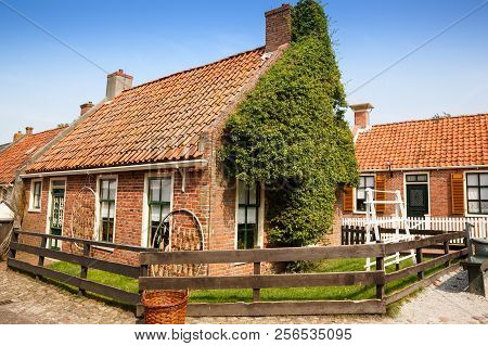 The Houses In The Traditional Old Fisherman Village Open-air Museum Of Zuiderzee (zuiderzeemuseum), 
