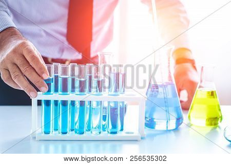 Chemistry Professor Scientist In Science Chemical Lab To Select New Medical Formular