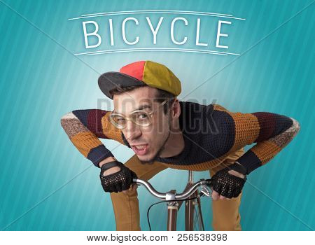Kooky young guy on a bike with cyclist keywording and streaky background