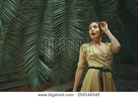 Pretty European Woman In Light Yellow Dress