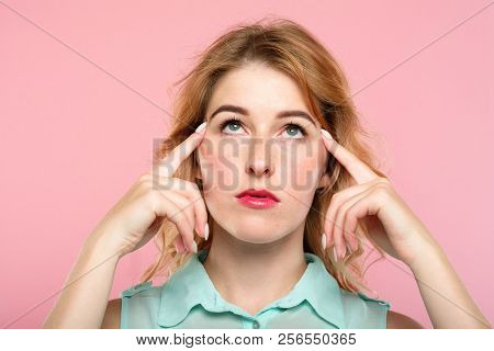 Mind Games Telepathy Thought Transfer And Brain Power. Beautiful Girl Concentrating On Invisible Obj