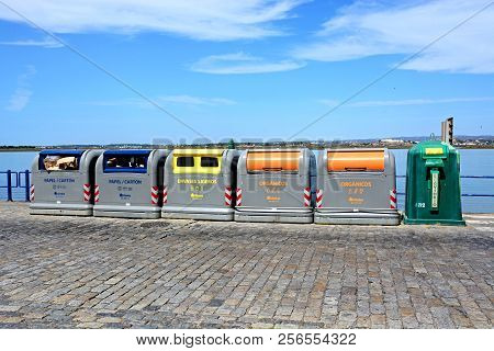 Ayamonte, Spain - June 11, 2017 - Recycling Bins Along The Waterfront With Views Across The River Gu