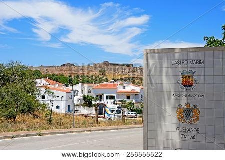 Castro Marim, Portugal - June 11, 2017 - View Of The Medieval Castle And Town Buildings With A Welco
