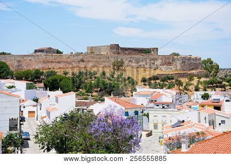 Castro Marim, Portugal - June 11, 2017 - Elevated View Of The Castle And Town Buildings With A Prett