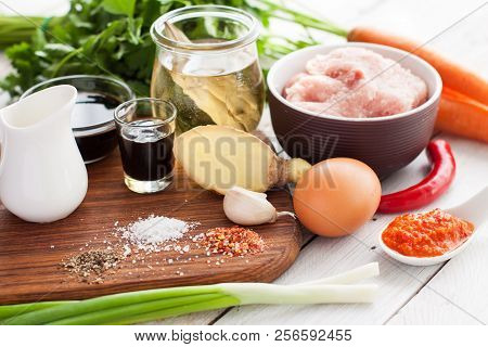 Ingredients For Thai Chili Chicken Meatballs With Sauce. Minced Meat, Egg, Ginger, Broth, Green Onio